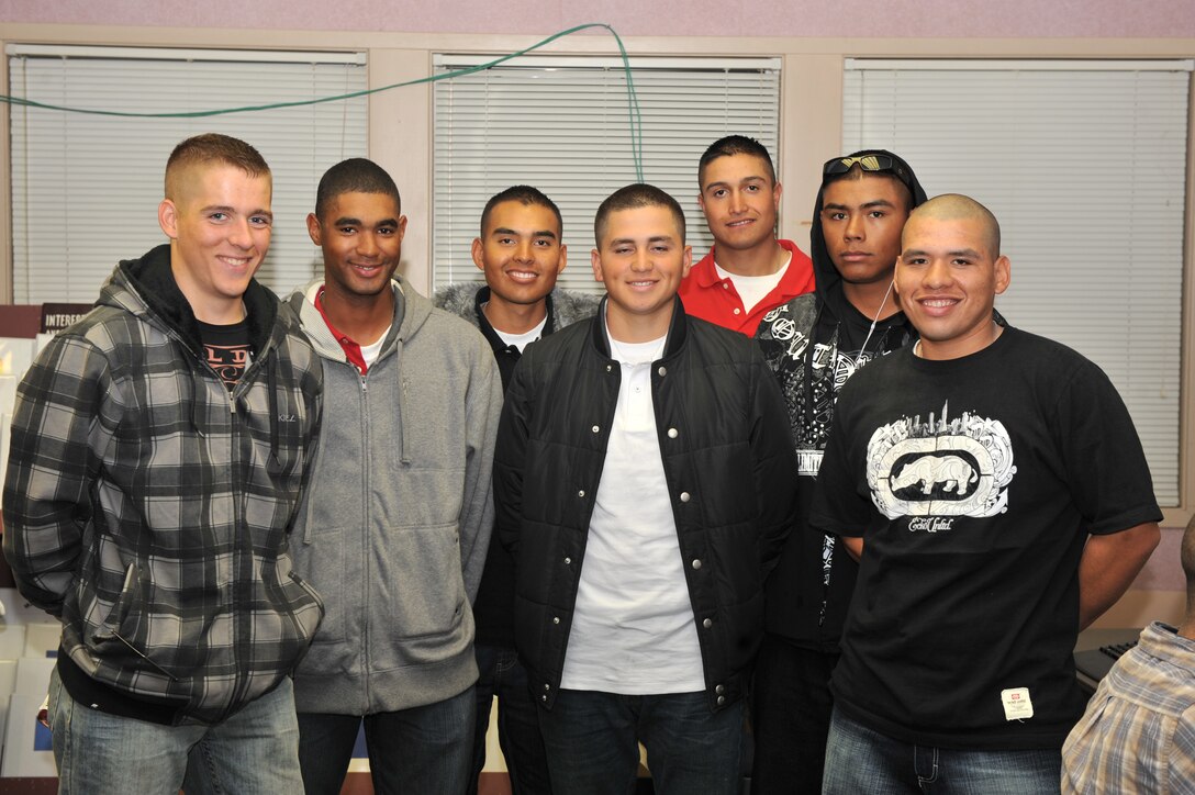 Scores of service members and their families ate Thanksgiving dinner at the United Services Organization Thursday. Many stayed to relax in the game room. Among them were Pfc. Tyler Scott, Pvt. Miguel Scott, Pvt. Emmanuel Rios, Pvt. Stephen Vasquez, Pfc. Jerry Limon, Pvt. Rudy Sanchez and Pfc. Manuel Vera III. The seven Marines all attend military occupational speciality school at Camp Johnson.